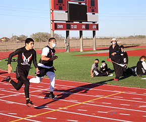 students running on a track